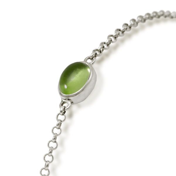 close up of Peridot Cabochon Bracelet - silver - by Scarab Jewellery Studio