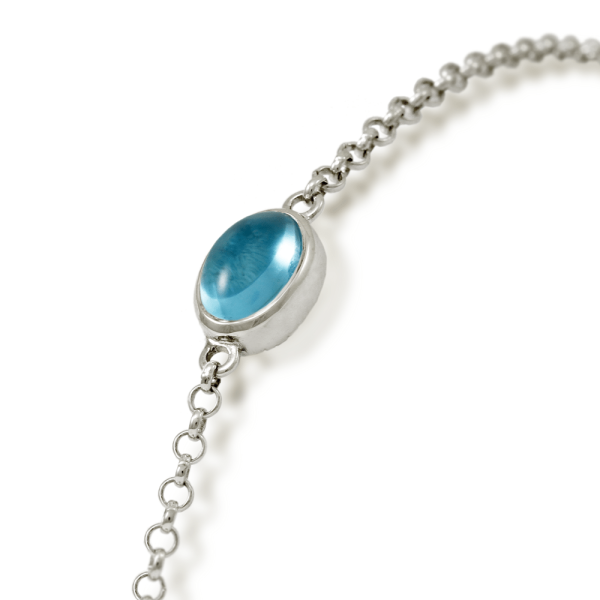 close up of Blue Topaz Cabochon Bracelet - silver - by Scarab Jewellery Studio