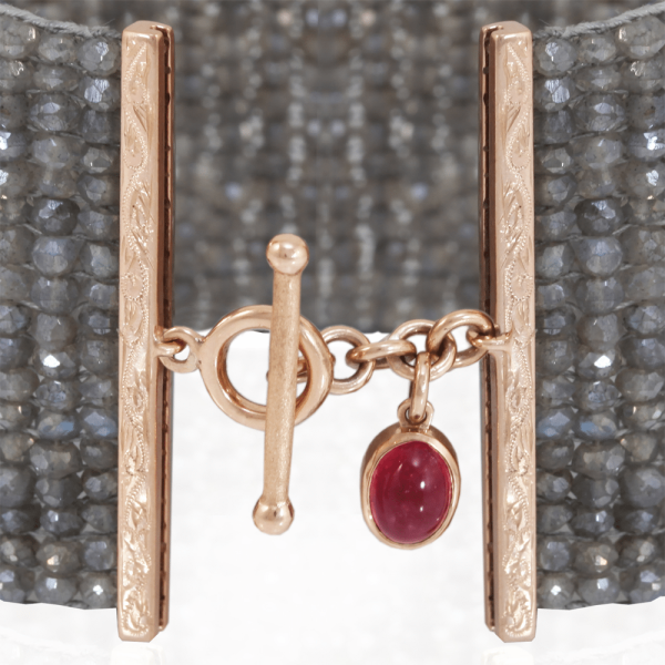 close up of woven labradorite bracelet cuff - with rose gold and pink tourmaline