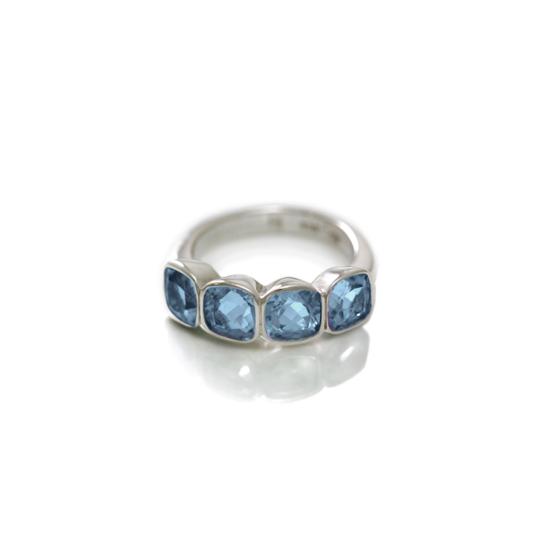 Four Stone Blue Topaz Silver Ring by Scarab Jewellery Studio