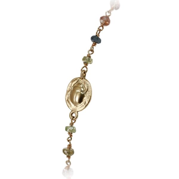 close up of scarab charm on sapphire multi colour faceted bead necklace by Scarab Jewellery Studio